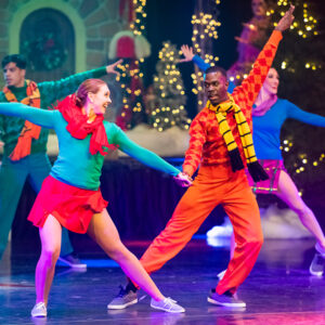 two dancers in christmas attire