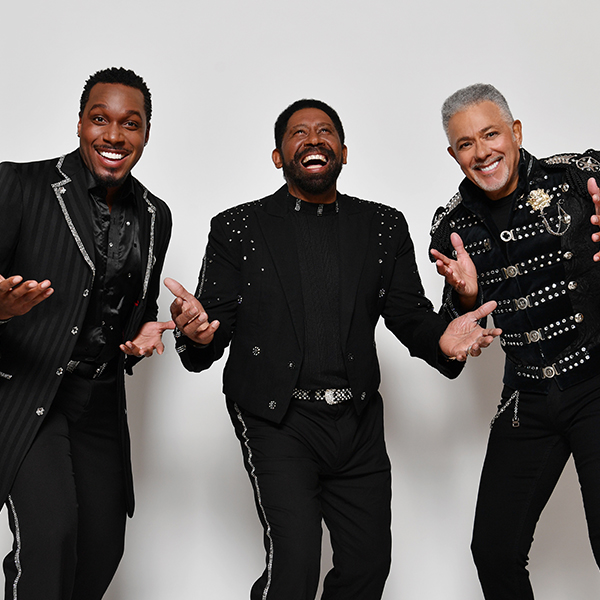 three members of commodores laughing